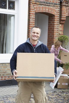 Removal van and moving team supporting a home move in Mortlake