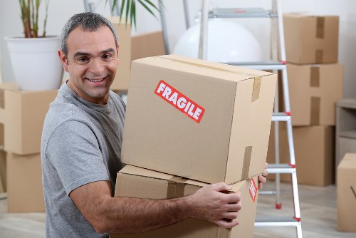 Removal services team preparing items for delivery
