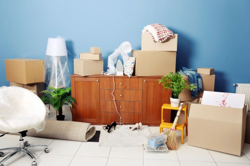 Packing boxes and furniture ready for a Mortlake relocation