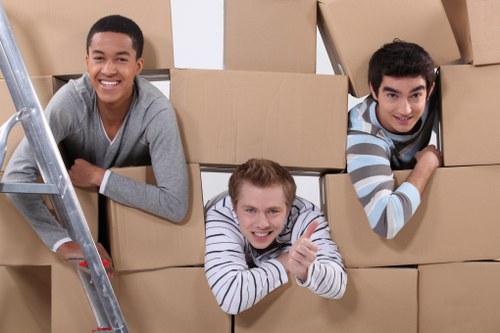 Packed boxes and furniture prepared for transport in Mortlake