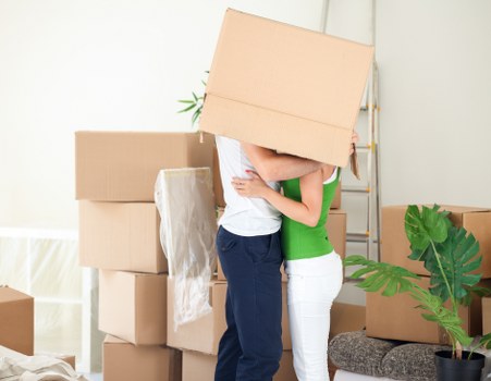 Office furniture being moved carefully during a Mortlake relocation